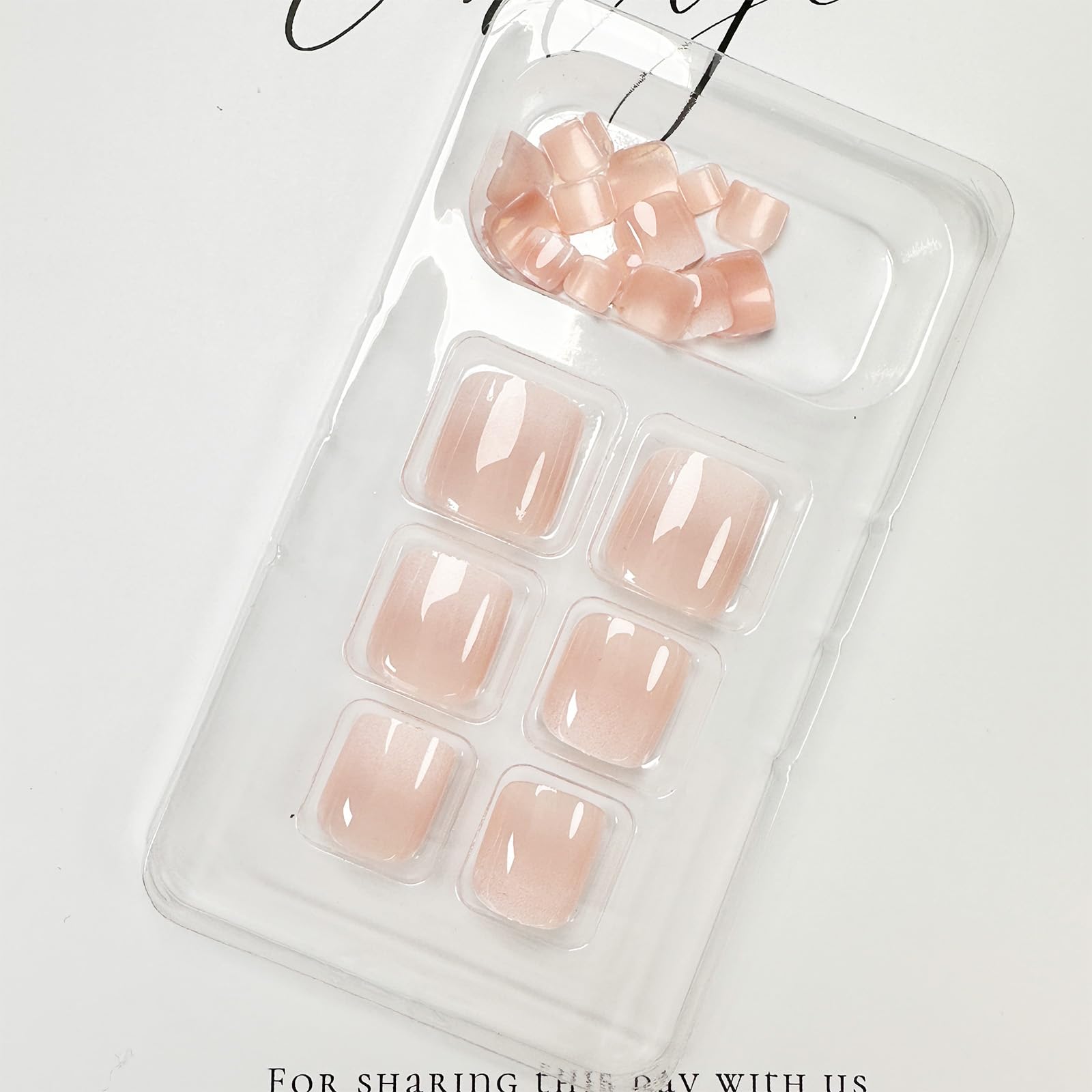 FJSMTOPl press-on toenail being applied for fast at-home pedicure