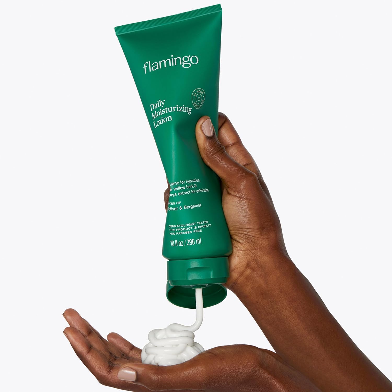 Flamingo lotion being applied to forearm illustrating quick absorption and non-greasy feel