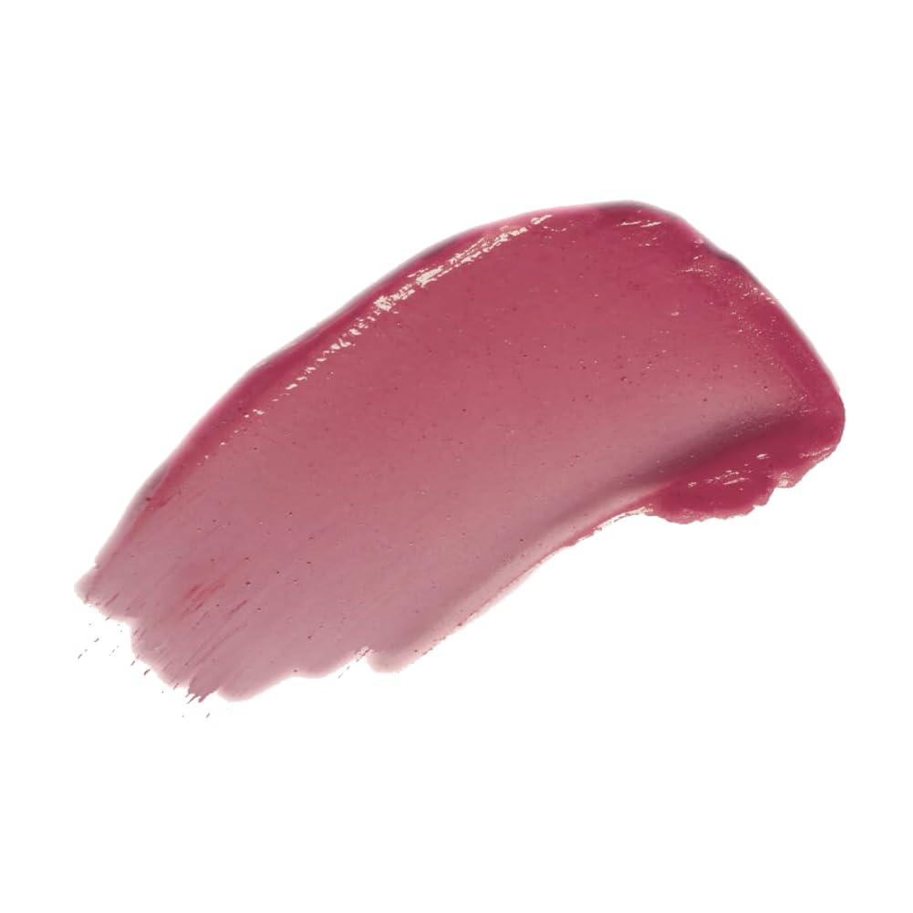FLOWER Beauty swatch on arm showing buildable berry color benefit