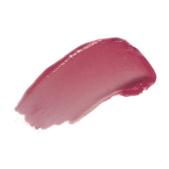 FLOWER Beauty swatch on arm showing buildable berry color benefit