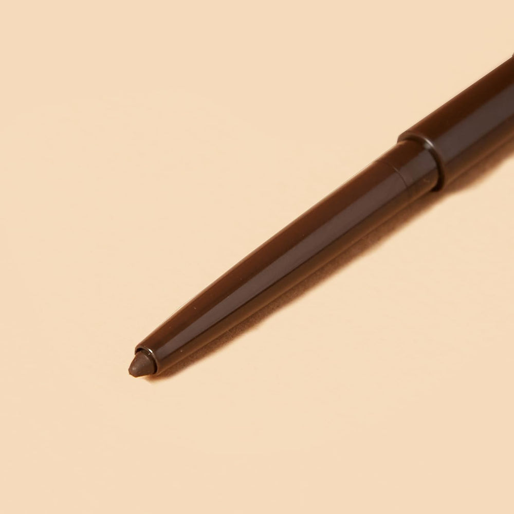 FLOWER Beauty pencil tip close-up showing smooth texture for precise application benefit