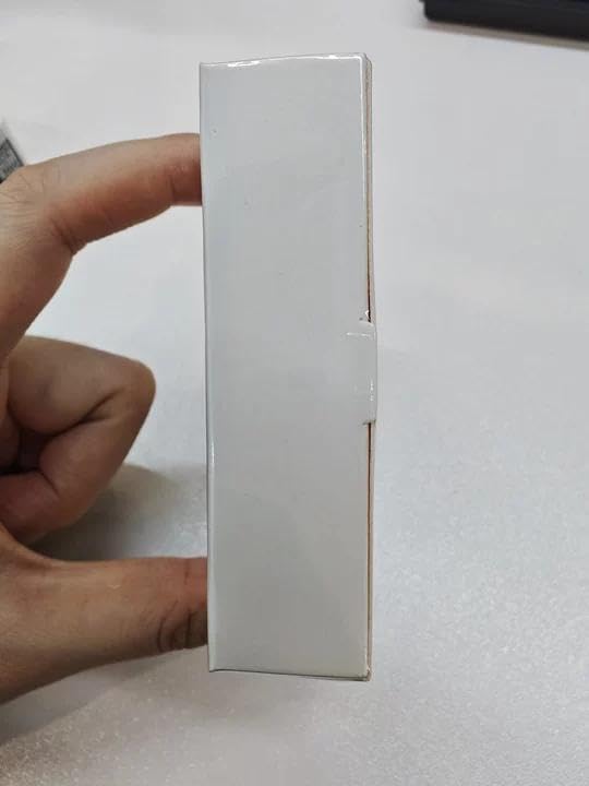FOCALLURE compact size comparison next to coin showing portable convenience benefit