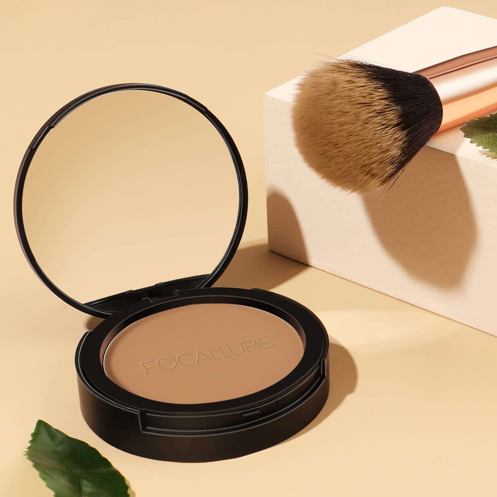 FOCALLURE hand holding compact showing size and easy application on the go
