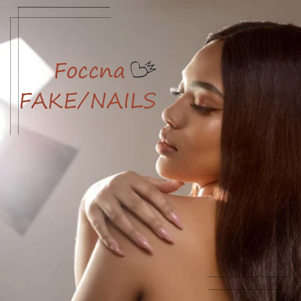 Foccna nails next to a coin showing length and size for realistic comparison