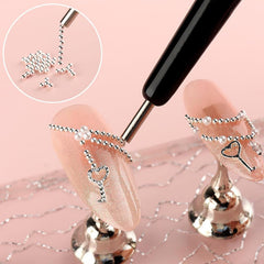 Fokostar beads applied on a nail demonstrating 3D accent and eye-catching polish complement