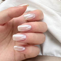 Fokostar angled nail catching light to reveal holographic pearl reflections