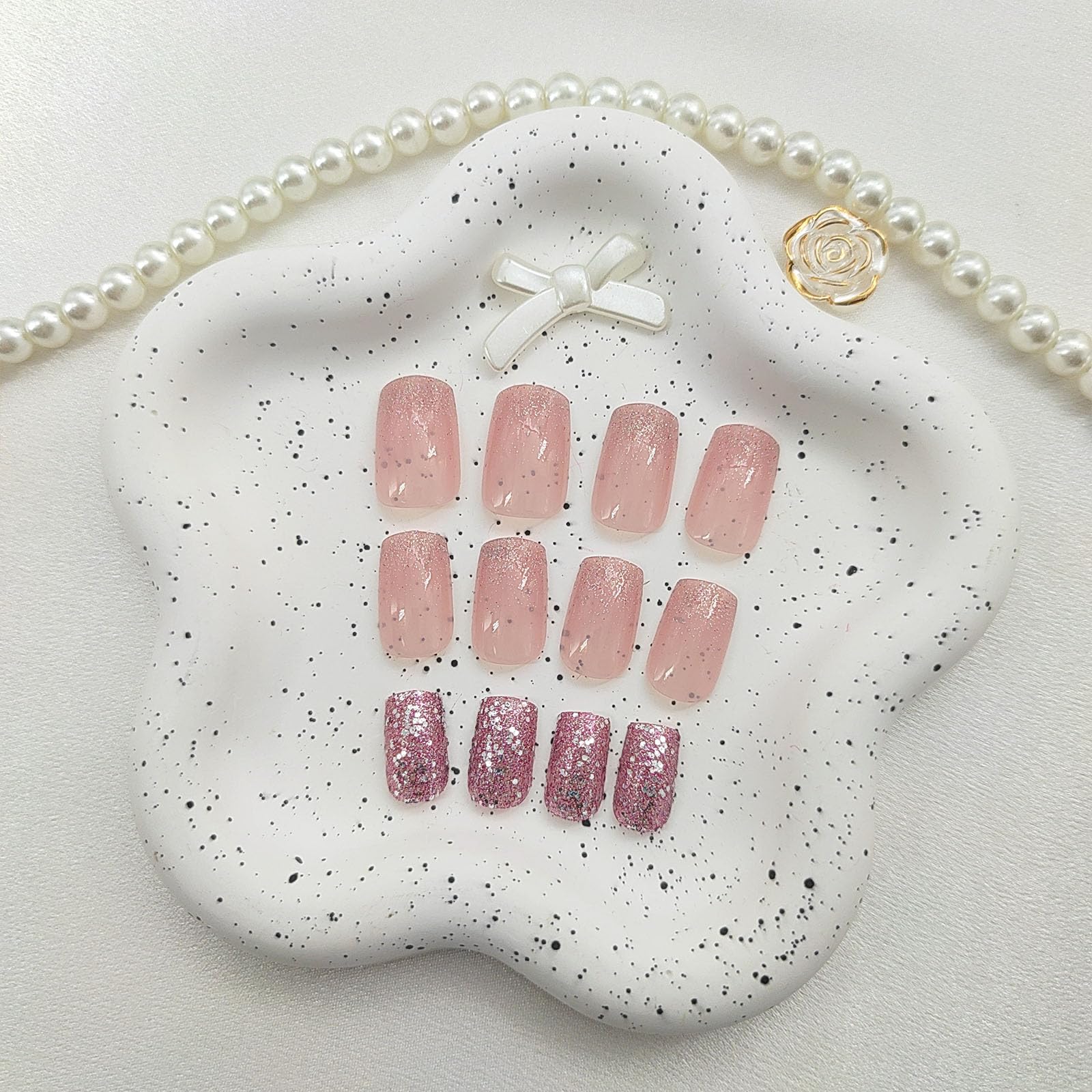 FOLONRAL flatlay with nails, nail file, wooden stick, and adhesive tabs showing included tools
