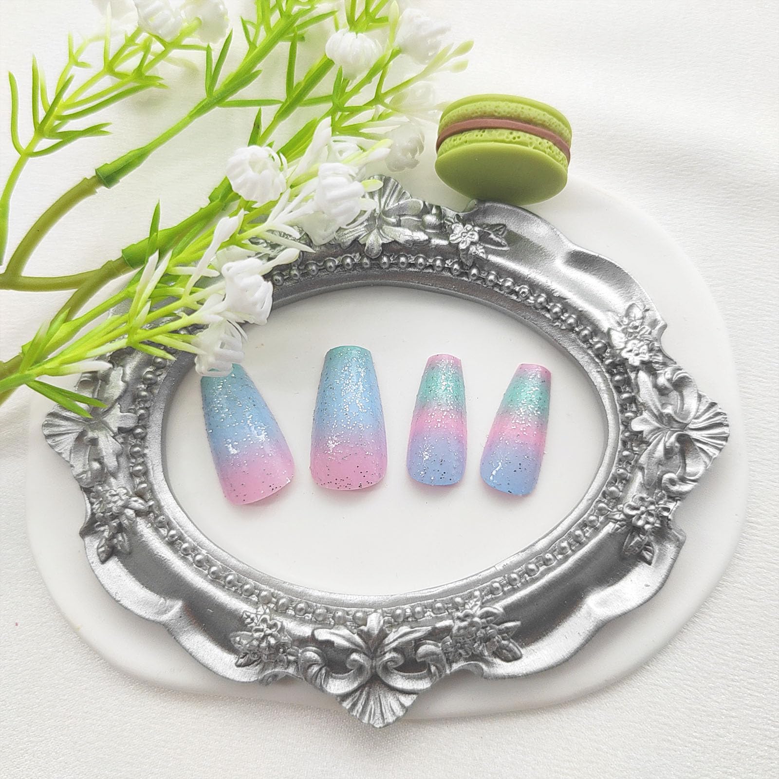 FOLONRAL nails held in hand showing medium length scale and practical wear benefit