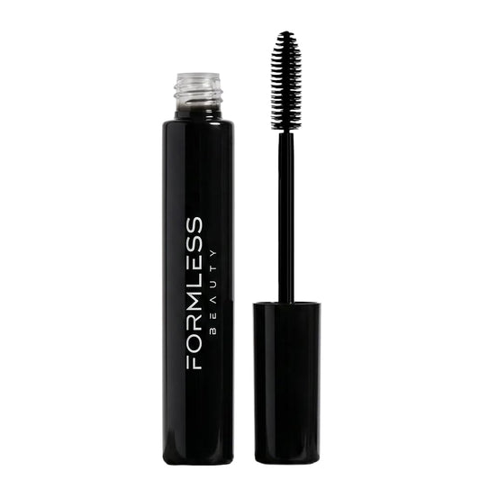 Formless Beauty Elevate Mascara front view showing sleek glass tube and label, conveys quality