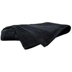 ForPro towel in salon use under hair color bottle demonstrating stain protection