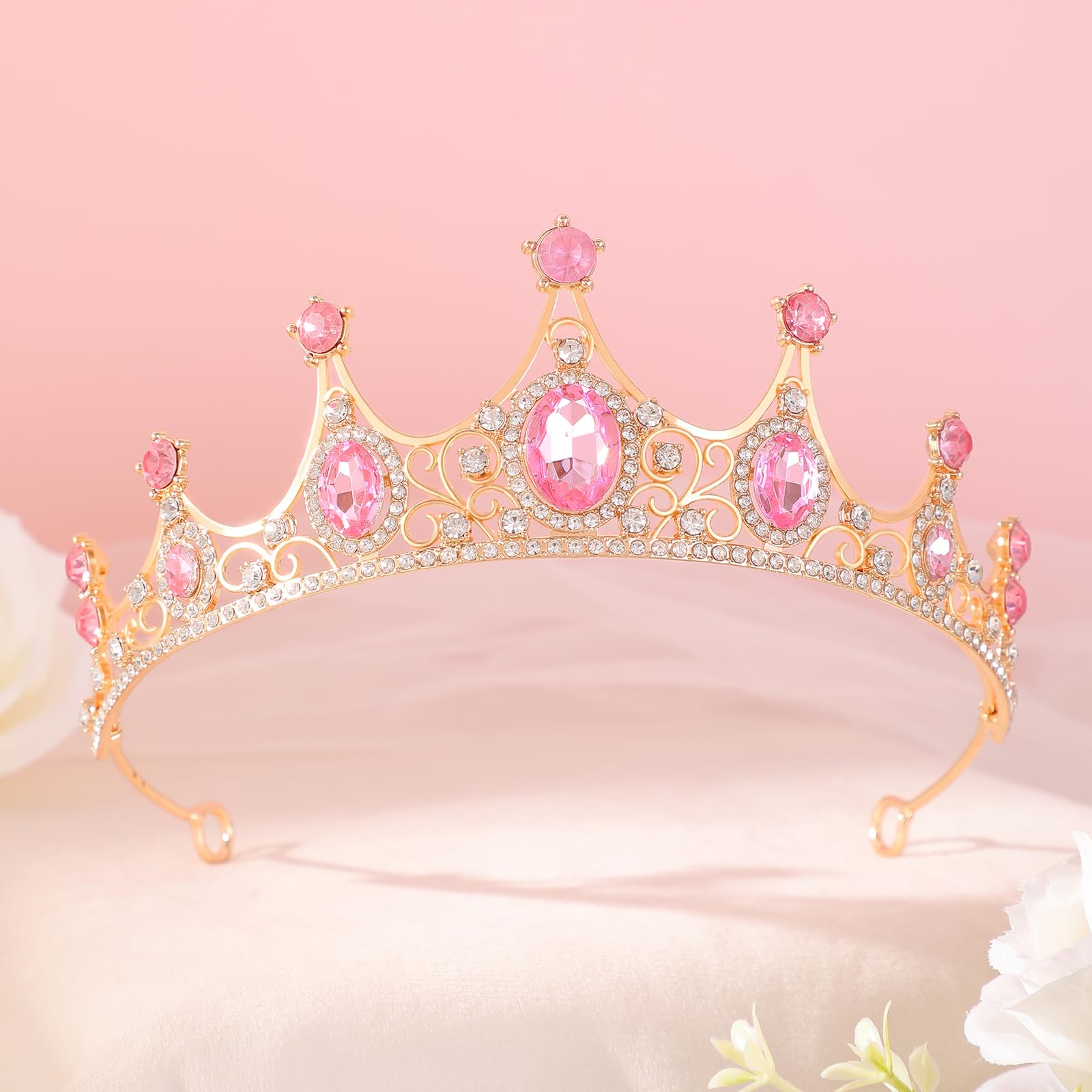 FORSEVEN tiara beside ruler showing approximately 2 inch height and scale