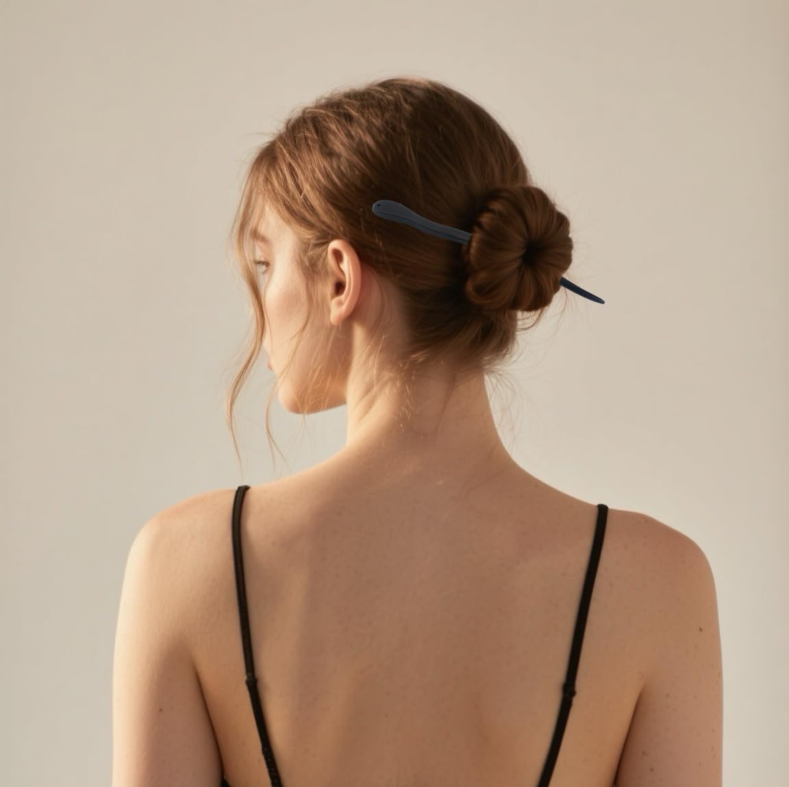 Fosrisix used in a neat bun illustrating secure hold and elegant appearance