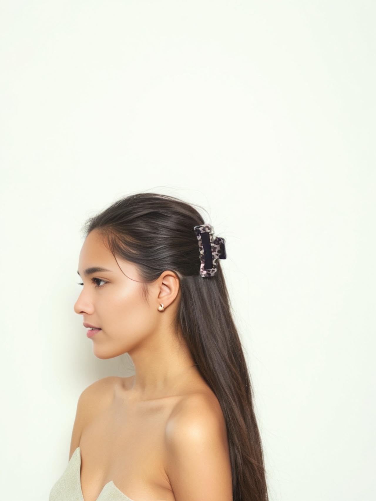 Fosrisix clip worn in hair demonstrating stylish hold for half-up or bun benefit