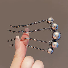 FQYN lifestyle image at a bridal party illustrating how pins accessorize formal outfits