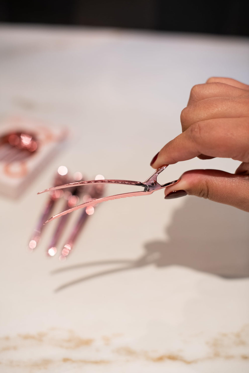 FRAMAR clips on a stylist workstation illustrating efficient salon use