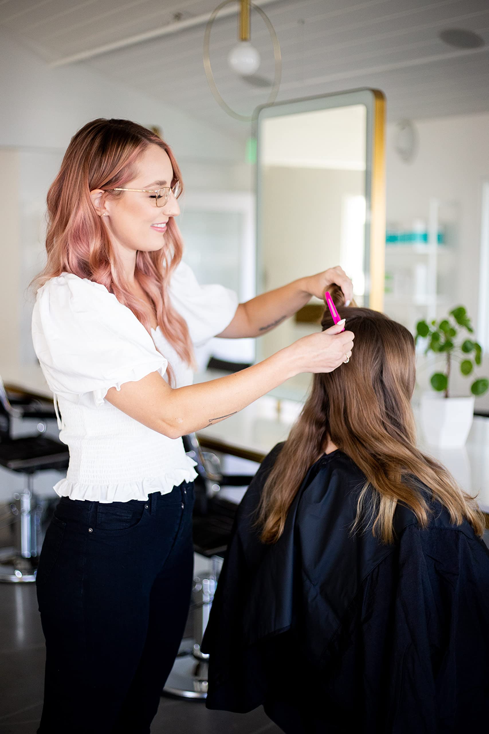FRAMAR clips alongside comb and dryer illustrating styling convenience benefit