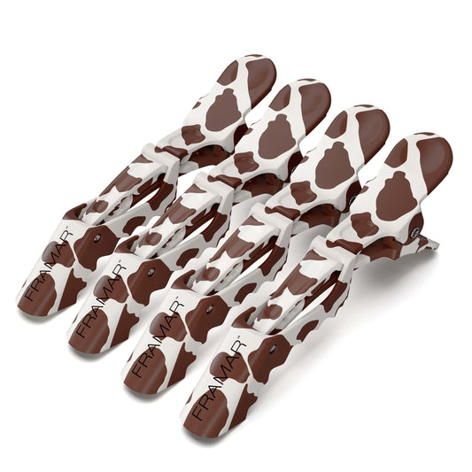 FRAMAR front view cow print clips showing matte finish and playful design benefit hold