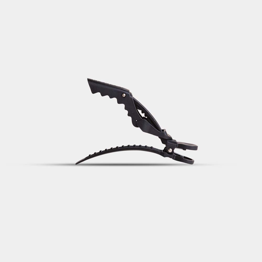 FRAMAR four clips laid flat illustrating pack contents and salon readiness