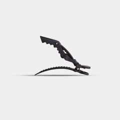 FRAMAR four clips laid flat illustrating pack contents and salon readiness