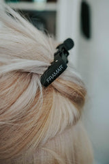 FRAMAR clips on salon counter with tools showing professional workflow ease