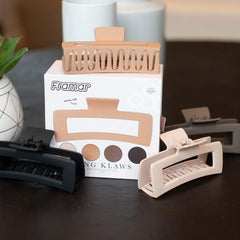 FRAMAR clip holding a high bun demonstrating comfortable all-day wear and stability
