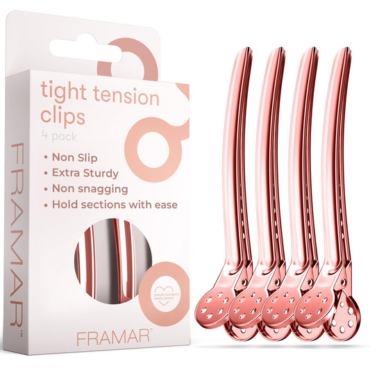 FRAMAR front view of four rose gold metal clips showing professional hold