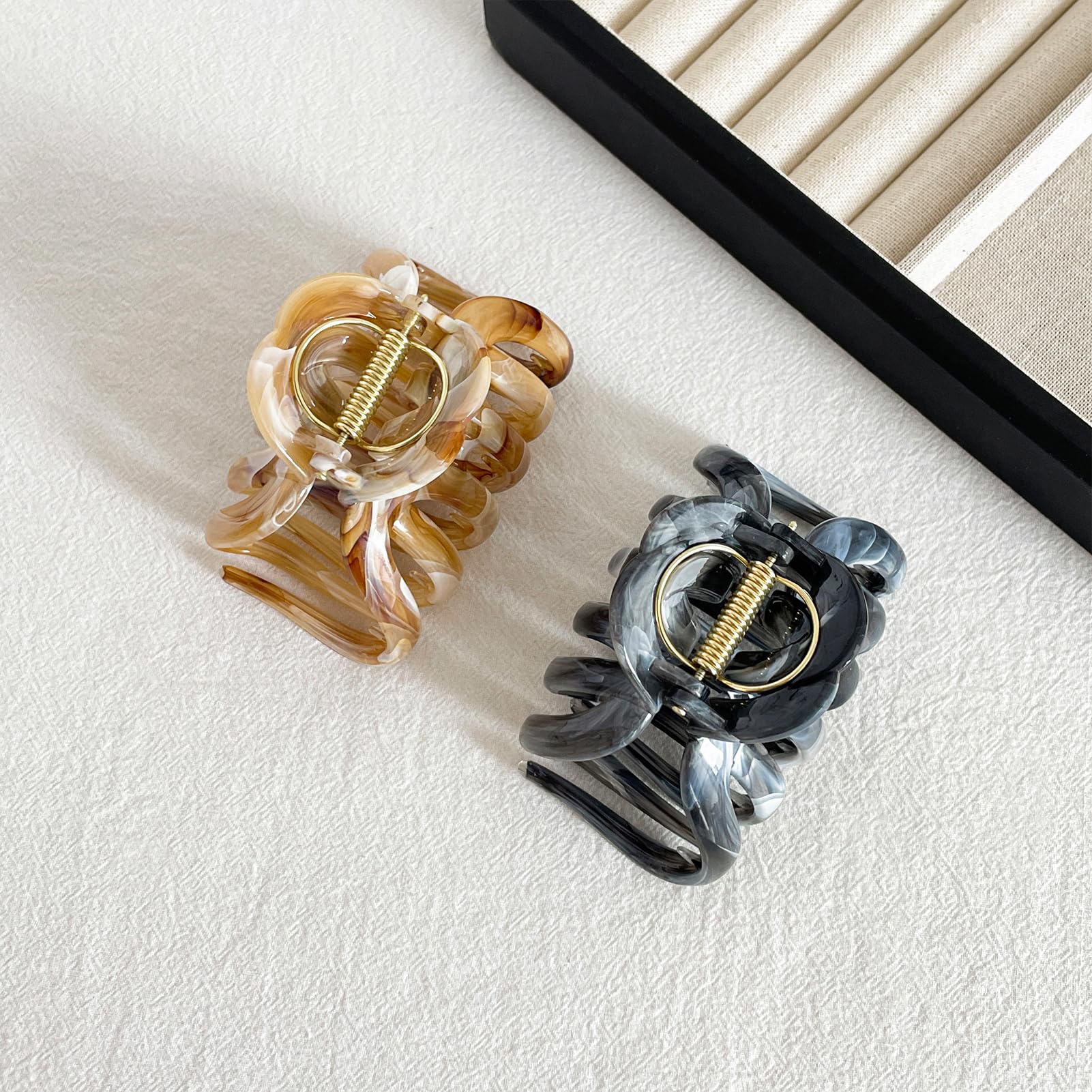 FRDTLUTHW clip securing a high bun in use shows dependable all-day support