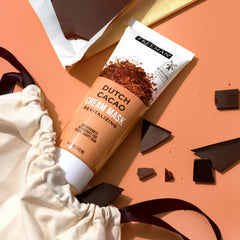 Freeman flatlay of tube and ingredient list showing transparent formulation benefit