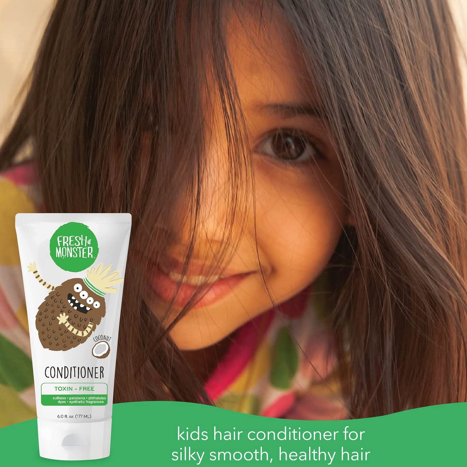 Fresh Monster conditioner pouring onto hand to show amount and easy application for parents