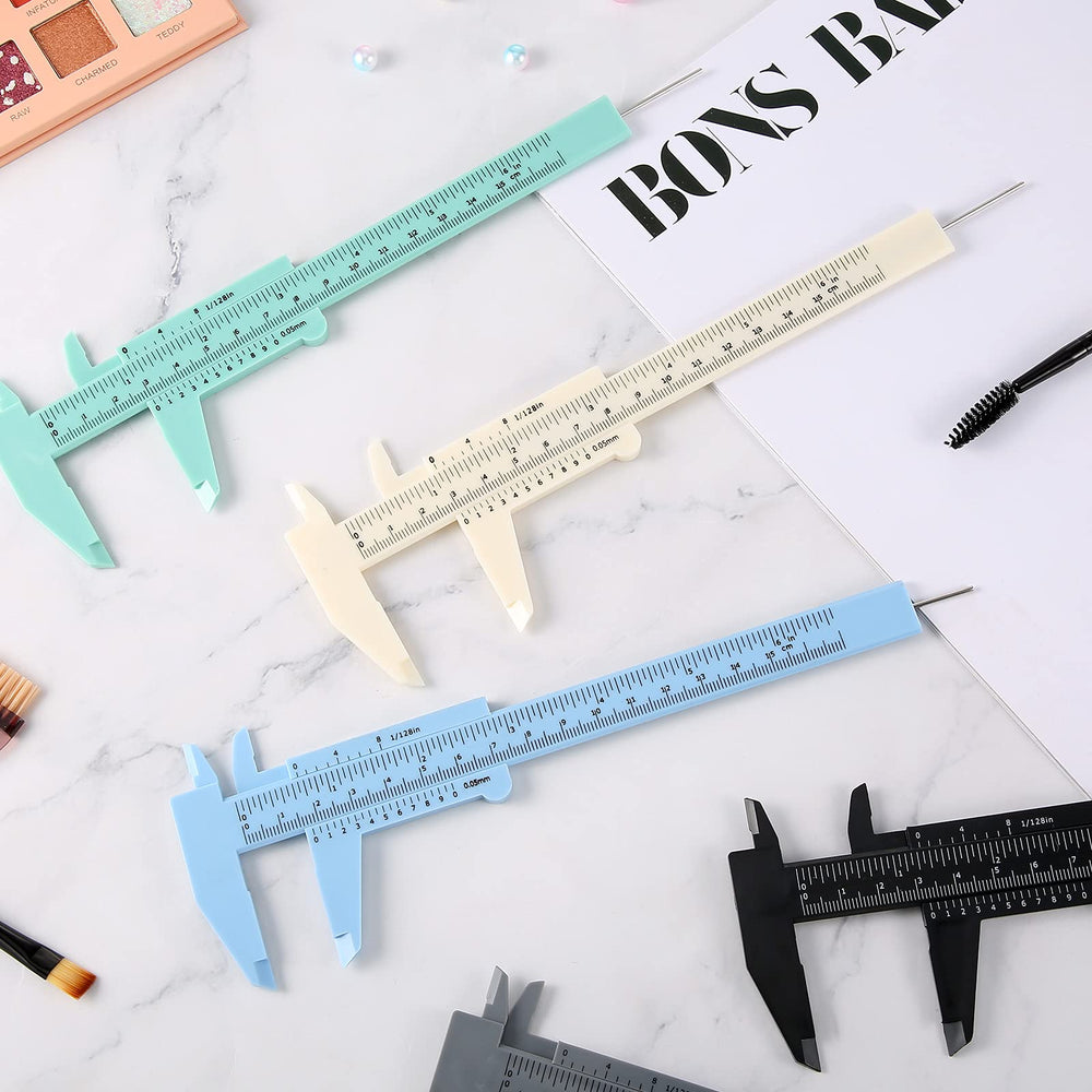 Frienda rulers on workbench flat lay indicating multiuse craft and professional utility