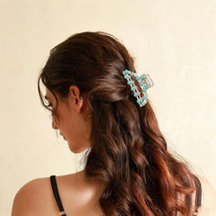 Frinnovan clip holding messy bun, illustrates secure updo support benefit
