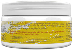 FroBabies Hair being scooped onto damp hair to enhance curl formation