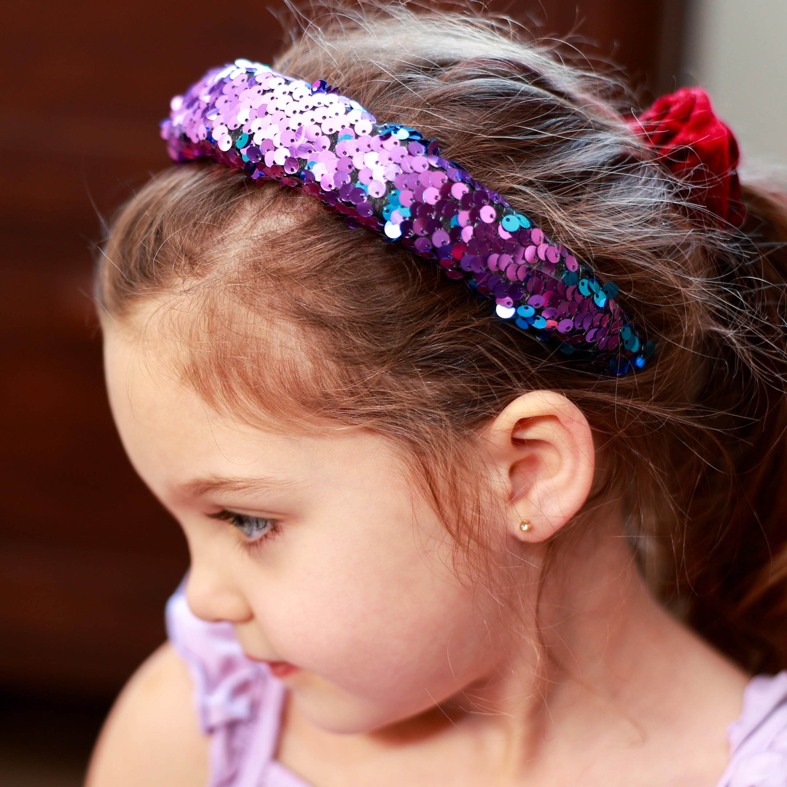 FROG SAC headband on a hand to show 13-inch scale and sizing clarity