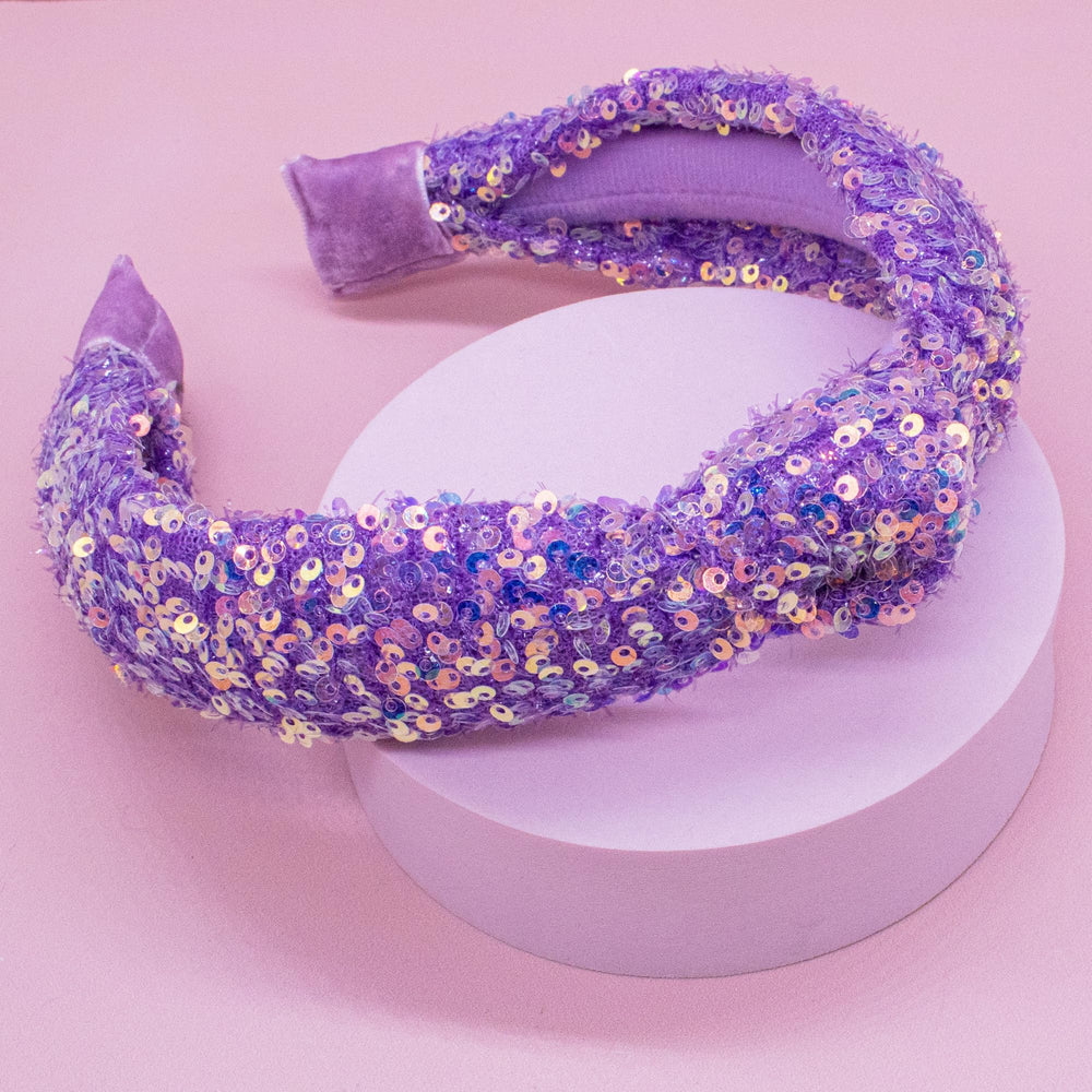 FROG SAC headband beside ruler showing 13-inch fit for most kids