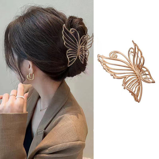 FRUZJAY gold butterfly clip front view showing elegant design and secure hold