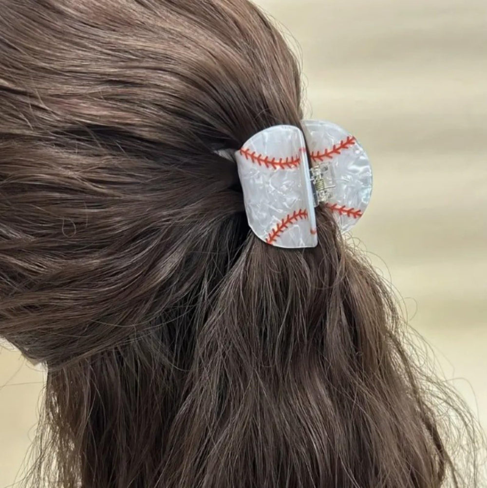 FRUZJAY red-and-white pattern detail showing playful baseball-inspired benefit