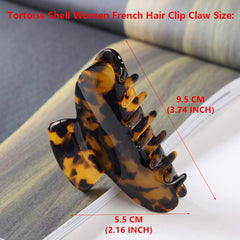 Fsmiling clip securing a thick bun and providing long-lasting, comfortable hold