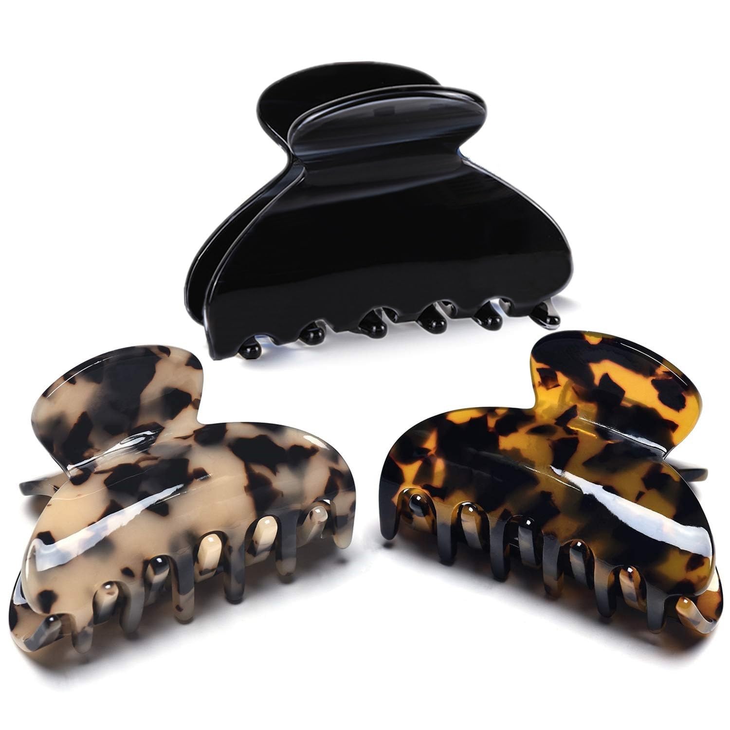 Fsmiling front view of three tortoise and leopard clips showing patterns and finish