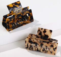 Fsmiling clips neatly packed in gift box showing present-ready appeal benefit