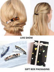 Fsmiling barrettes arranged on dresser suggesting effortless styling and storage