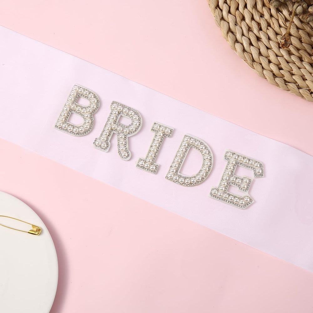 Fucibt sash displayed on party table adding cohesive celebratory decor
