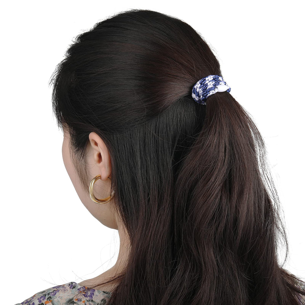 Funtopia hair tie holding a thick ponytail securely during exercise