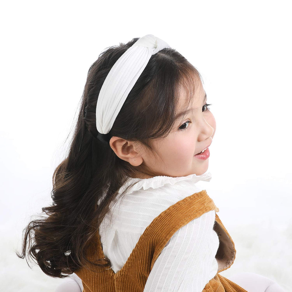 Funtopia headband next to hand showing flexible size and fit benefit