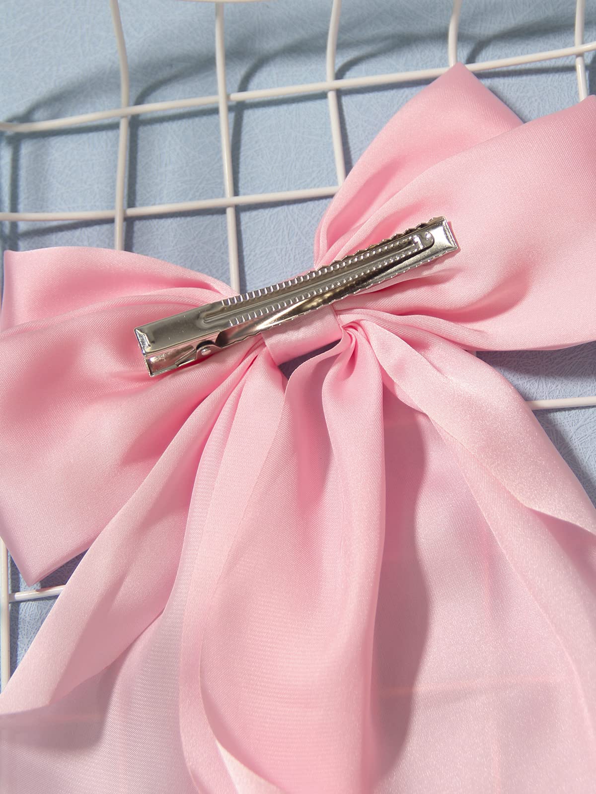 Furling Pompoms clip detail shows alligator teeth and spring for secure hold