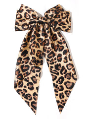Furling Pompoms front view camel leopard bow adds bold style