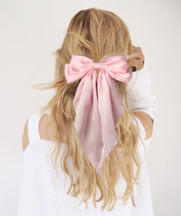 Furling Pompoms styled with party outfit presents festive finishing touch