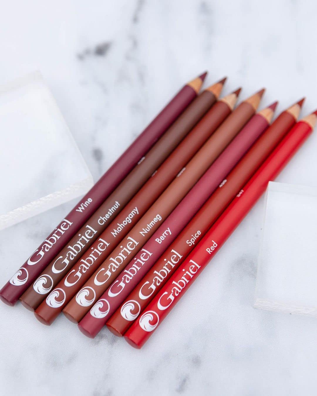 Gabriel Cosmetics Nutmeg paired with lipstick showing color harmony