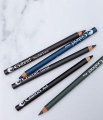 Gabriel Cosmetics navy eyeliner applied on model eye for defined, smudgeable line