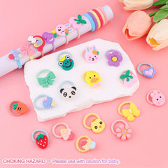 GA&EN hair ties shown in hand to illustrate miniature size