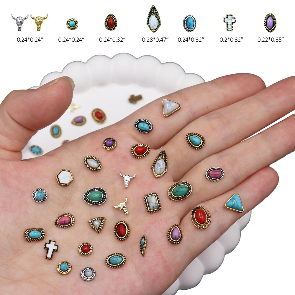 Ganepwns charms applied on an accent nail showing bold western style